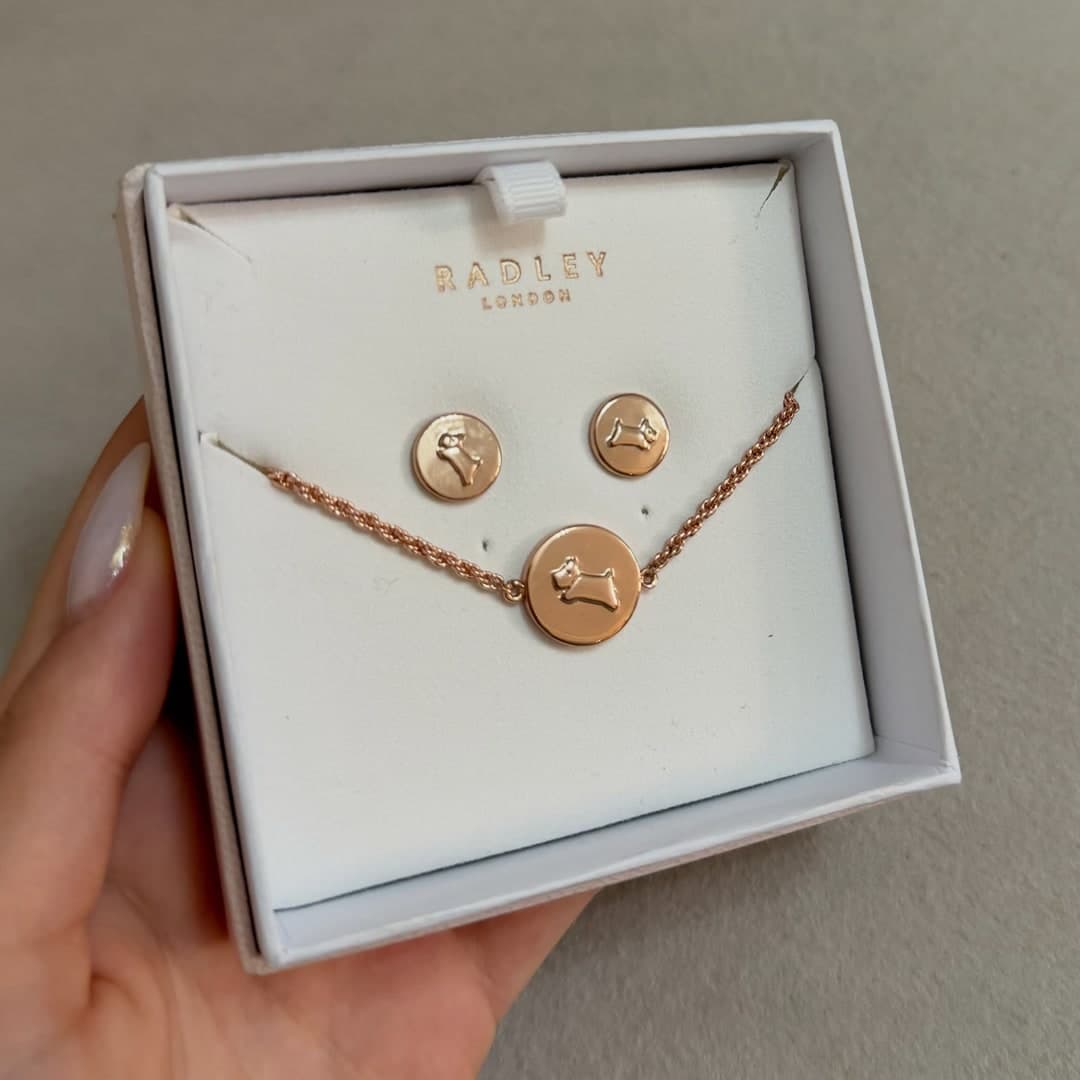 Set Radley London: byzylyk dhe vathë me qenushin Radley, ngjyrë ari rozë