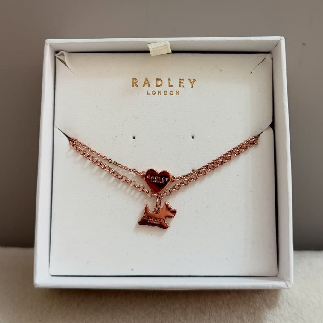 Byzylyk Radley London me dy zinxhirë, zemër dhe qenush, ngjyrë ari rozë