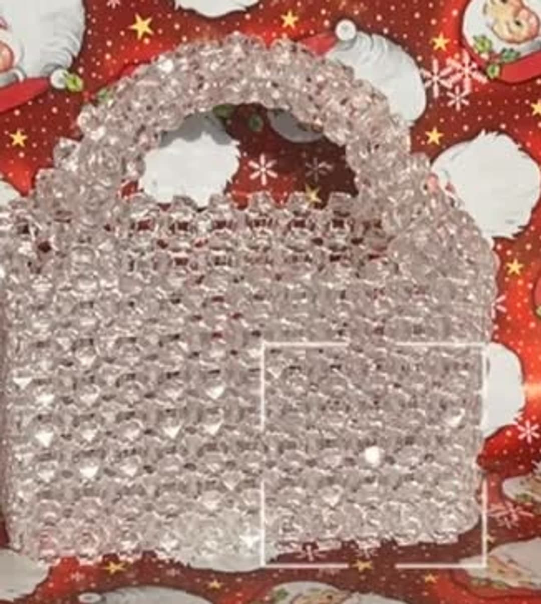 Çantë e tejdukshme me rruaza, në formë kutie